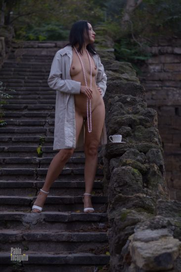 Nude in beads on the steps