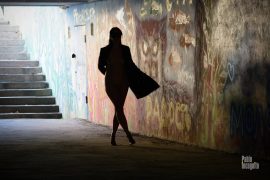 Silhouette of a girl in an underpass. Nude photoshoot by Pablo Incognito
