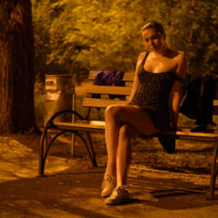 The girl is flirting. Posing in the park at night on a bench. Nude photo by Pablo Incognito