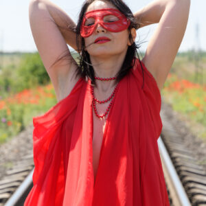 Naked girl in a mask posing on the rails. Nude photo by Pablo Incognito