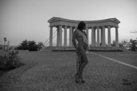 Black and white photo, a naked girl posing near the Vorontsov colonnade Odessa