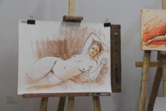 A drawing of nude model Irene Adler made in an art studio photo
