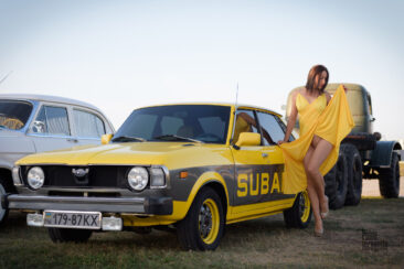 Nude model staged a striptease at an exhibition of retro cars in Kiev