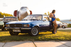 Blue Opel retro car and girl nude photoshoot