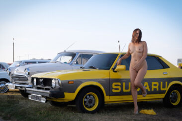 Naked visitor to the exhibition of retro cars in Kiev