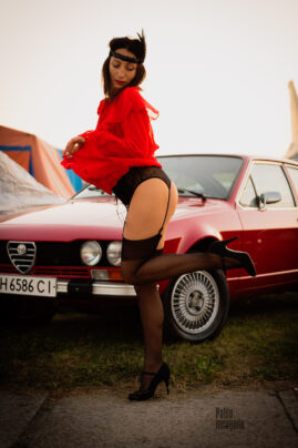 Girl posing bottomless near Alfa Romeo. Nude photographer Pablo Incognito