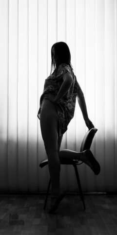 Portrait of a woman bared slender legs