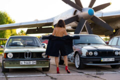 Female exhibitionism at an exhibition of vintage cars BMW. Nude photos of Pablo Incognito