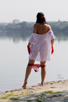 A girl with her panties down on the river bank. Photo by Pablo Incognito