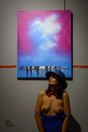 Topless in an art gallery
