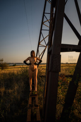 Naked in long gloves. Nude photo near the electric pole. Pablo Incognito