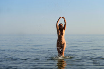 A nudist swims in the sea. Nude photo by Pablo Incognito