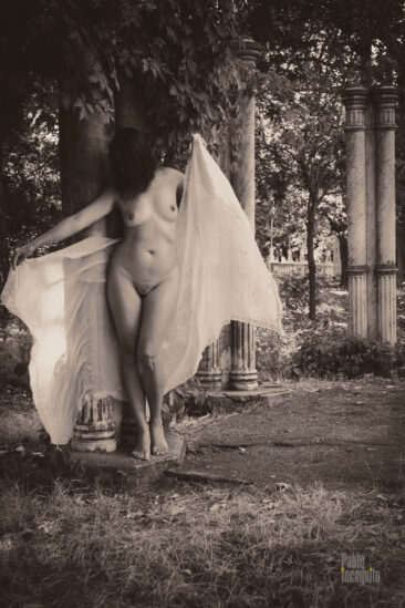 Nude photo. Retro. Black and white. Naked near the column. Pablo Incognito