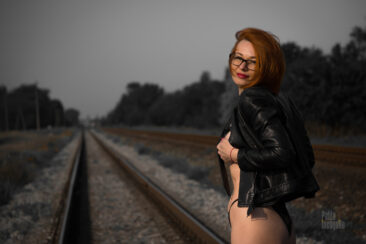 Redhead in panties posing on the rails. Nude photo by Pablo Incognito