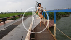 Bottomless video. Nude on the bridge. The wind lifts the short dress. Nude photographer Pablo Incognito
