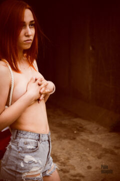 The girl shyly covered her bare chest. Nude photo by Pablo Incognito