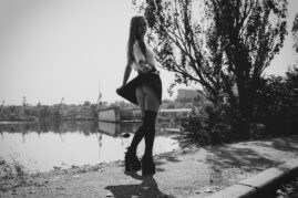 Black and white nude photo session near the river