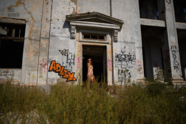 Naked girl in the doorway