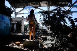 Naked girl with an umbrella